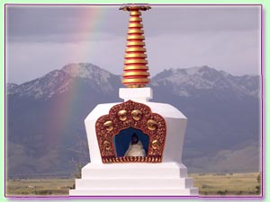 Rainbow over stupa 